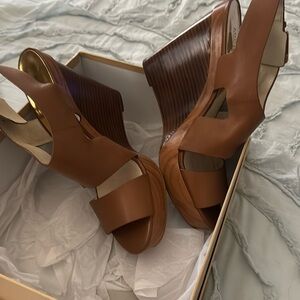 Michael Kors cute as hell brown leather 5 in wedge- bought in Vegas at MK store